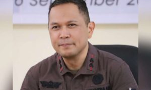 Dr. Reinhard Tololiu