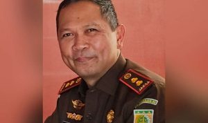 Dr. Reinhard Tololiu